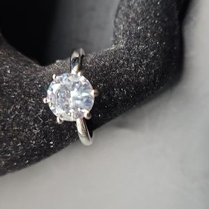 G-1 Silvertone clear solitaire ring